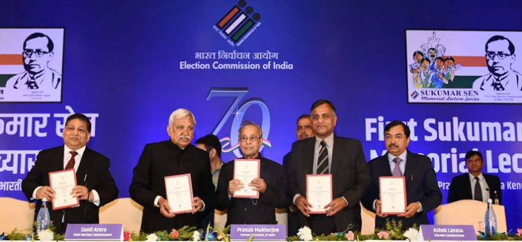 pranab mukherjee releasing the reprint of the report on india's first election