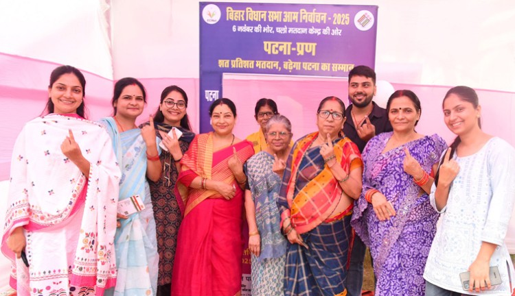 bihar voters showing indelible ink mark at polling station