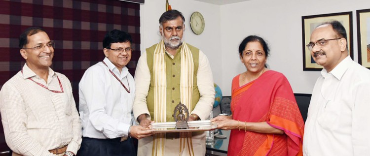finance minister handed over ancient statue of buddha to minister of state