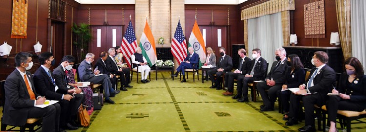 pm and joe biden hold high level talks in tokyo