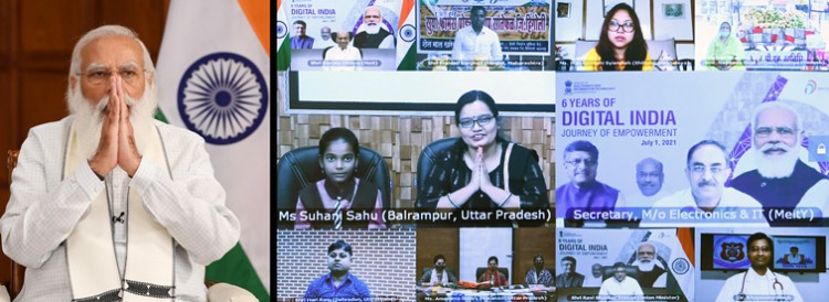 narendra modi interacting with the beneficiaries of 'digital india'