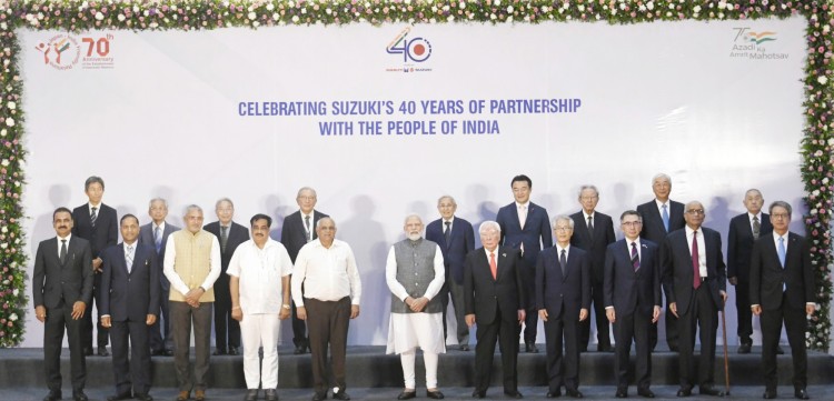 pm at the foundation stone laying ceremony of suzuki ev battery plant at hansalpur gujarat