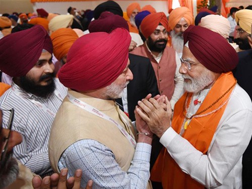 pm hosts sikh delegates