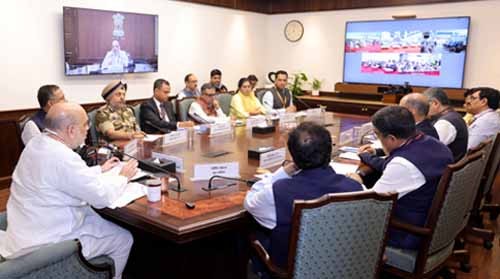 home minister launches fast track immigration-trusted traveler program