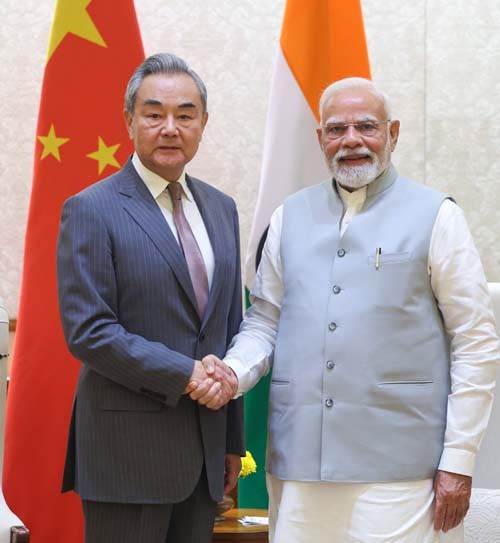 chinese foreign minister wang yi meet pm narendra modi