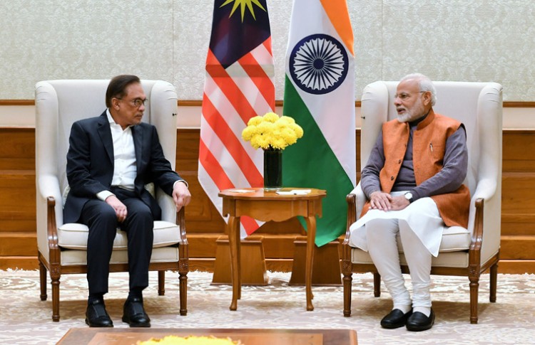 member of the malaysian parliament, datuk seri anwar ibrahim calling on the narendra modi