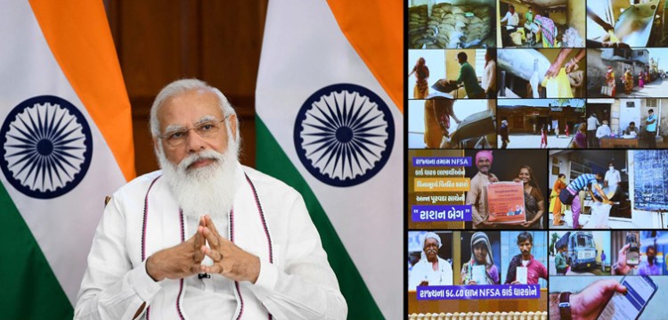 narendra modi interacts with the beneficiaries of pradhan mantri garib kalyan anna yojana