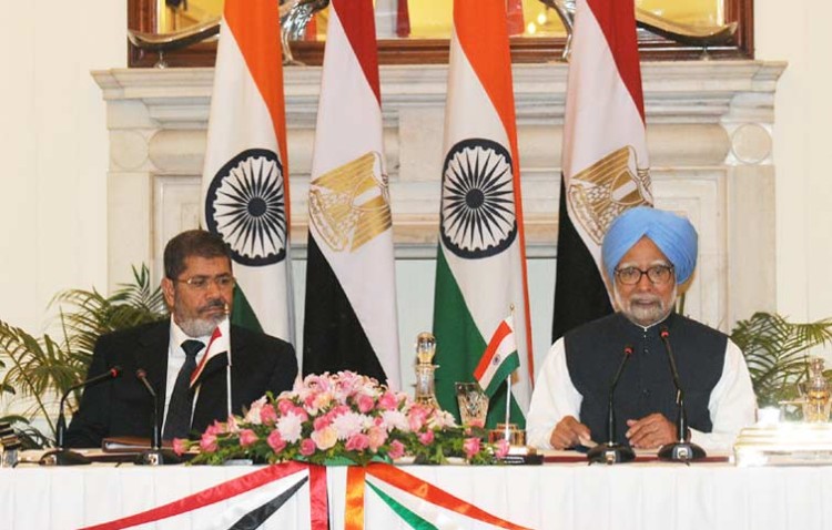 dr. mohamed morsy and manmohan singh
