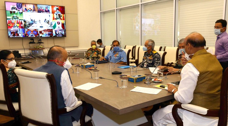 rajnath singh reviewing the undertaken to fight covid-19 with the various commanders in chief