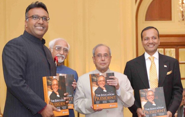 pranab mukherjee receiving the book the education president