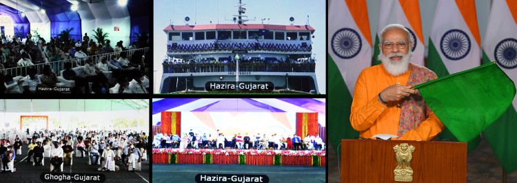 pm narendra modi flags ro-pax ferry service to hazira