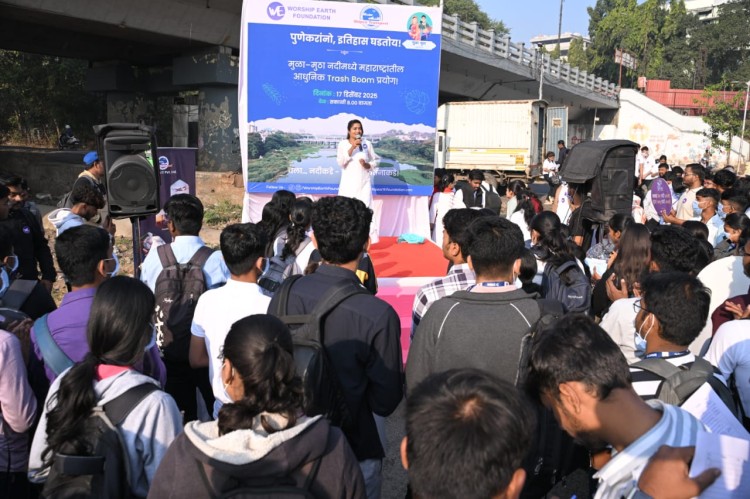 'trash booms' installed to save the mula mutha river in pune.