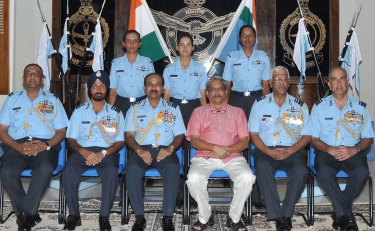 manohar parrikar and air chief marshal with commissioned women fighter pilots