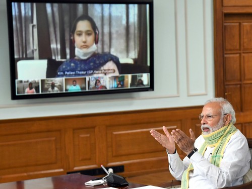 narendra modi interacting with the sarpanchs from across the country