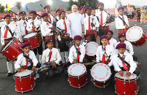 pm's invitation to tribal musical band