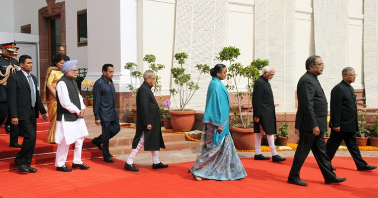pranab mukherjee being led in a ceremonial procession to the central hall of parliament house to address the joint session of the parliament on budget
