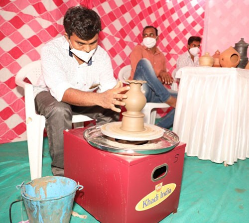 electric chalks were distributed to hundred trained artisans