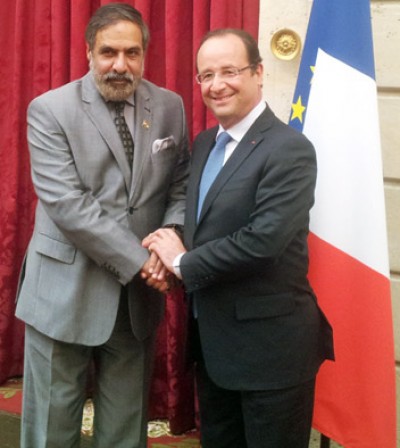 the union minister for commerce & industry, anand sharma with the president of france, mr. francois hollande, in paris