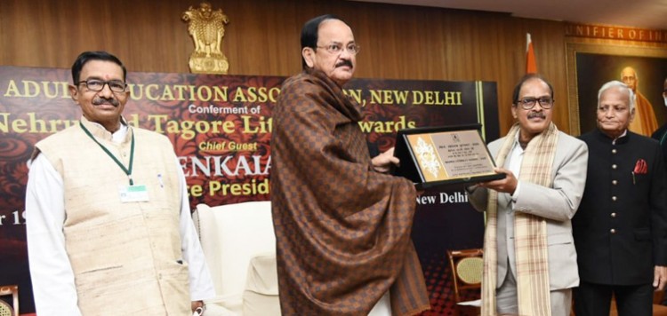 vice president presenting the nehru and tagore literacy awards