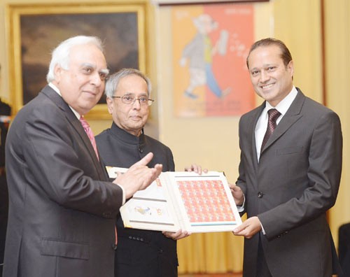 pranab mukherjee releasing the commemorative stamp of times of india