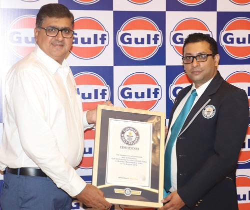 ravi chawla, md, gulf oil receiving certificate for guinness record