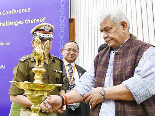 manoj sinha lighting the lamp at the inauguration of the conference