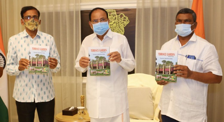 vice president received the first copy of the english translation book terrace garden