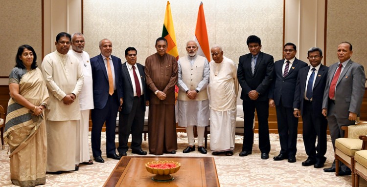 narendra modi with a delegation led by the speaker of the sri lankan parliament