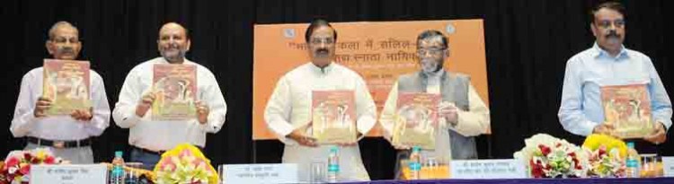 releasing a book bharatiya kala mein salil kreedayen evam sadyhsnata nayika
