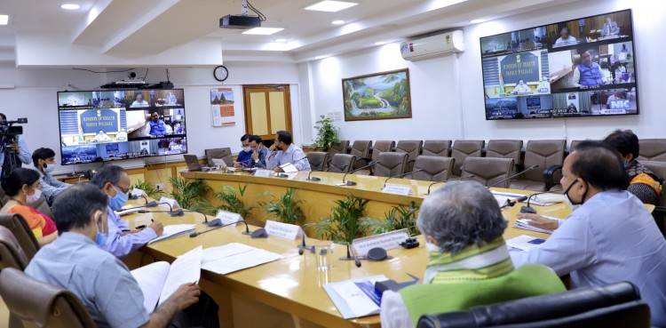 harsh vardhan chairing a high level review meeting
