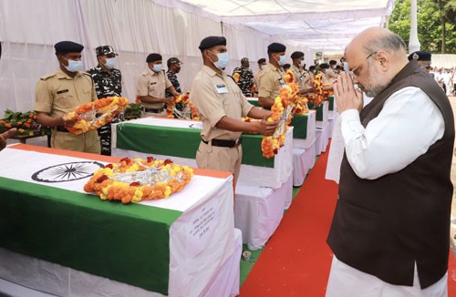 saluting martyred soldiers taking iron from naxalites